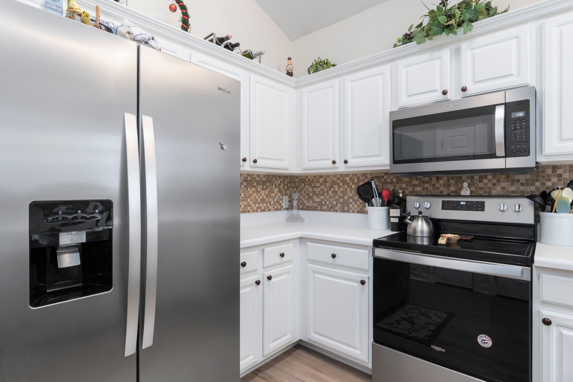 A home kitchen with a refrigerator
