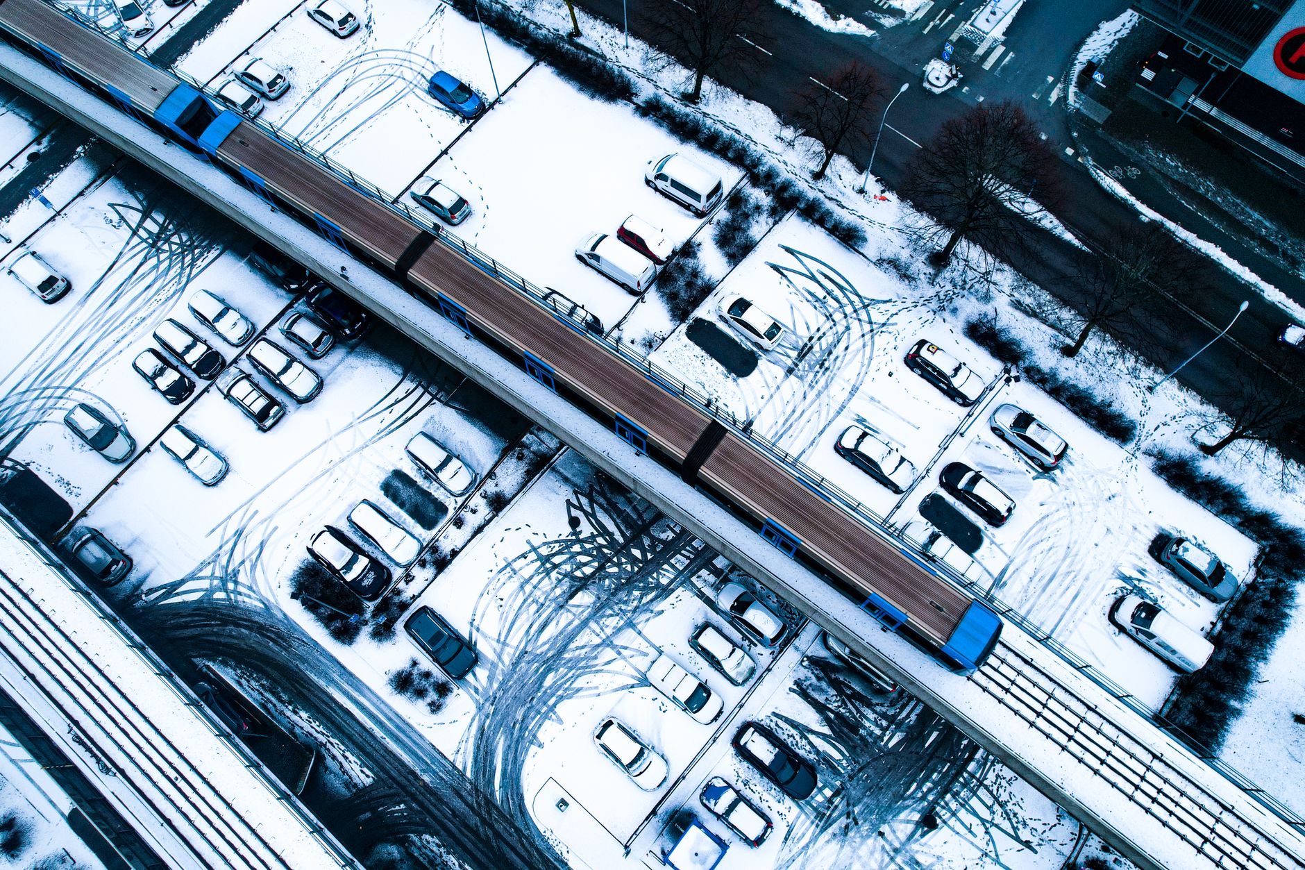 Cars parked outside after a snowfall
