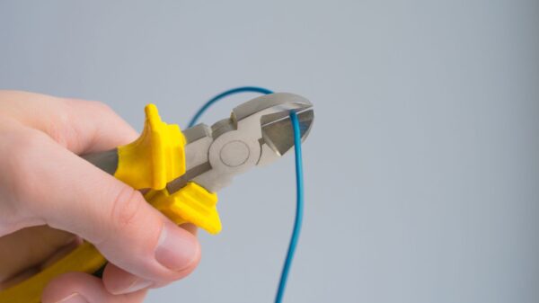Best wire stripper: hand tools laid out on a workbench