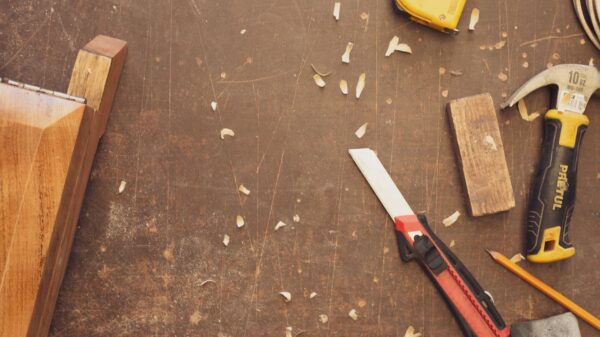 Best workbench: a garage work bench with hand tools on the wall