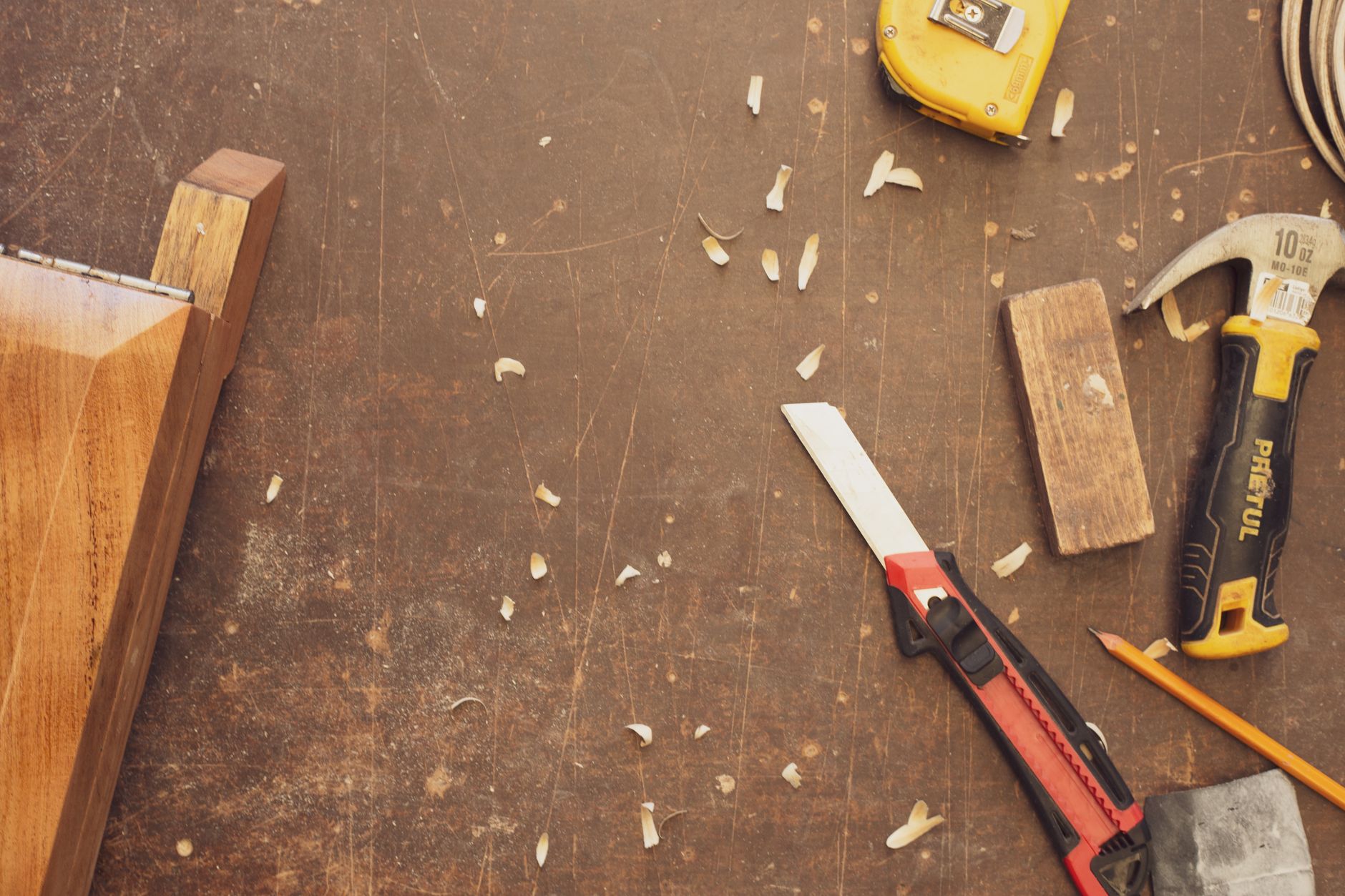 Best workbench: a garage work bench with hand tools on the wall
