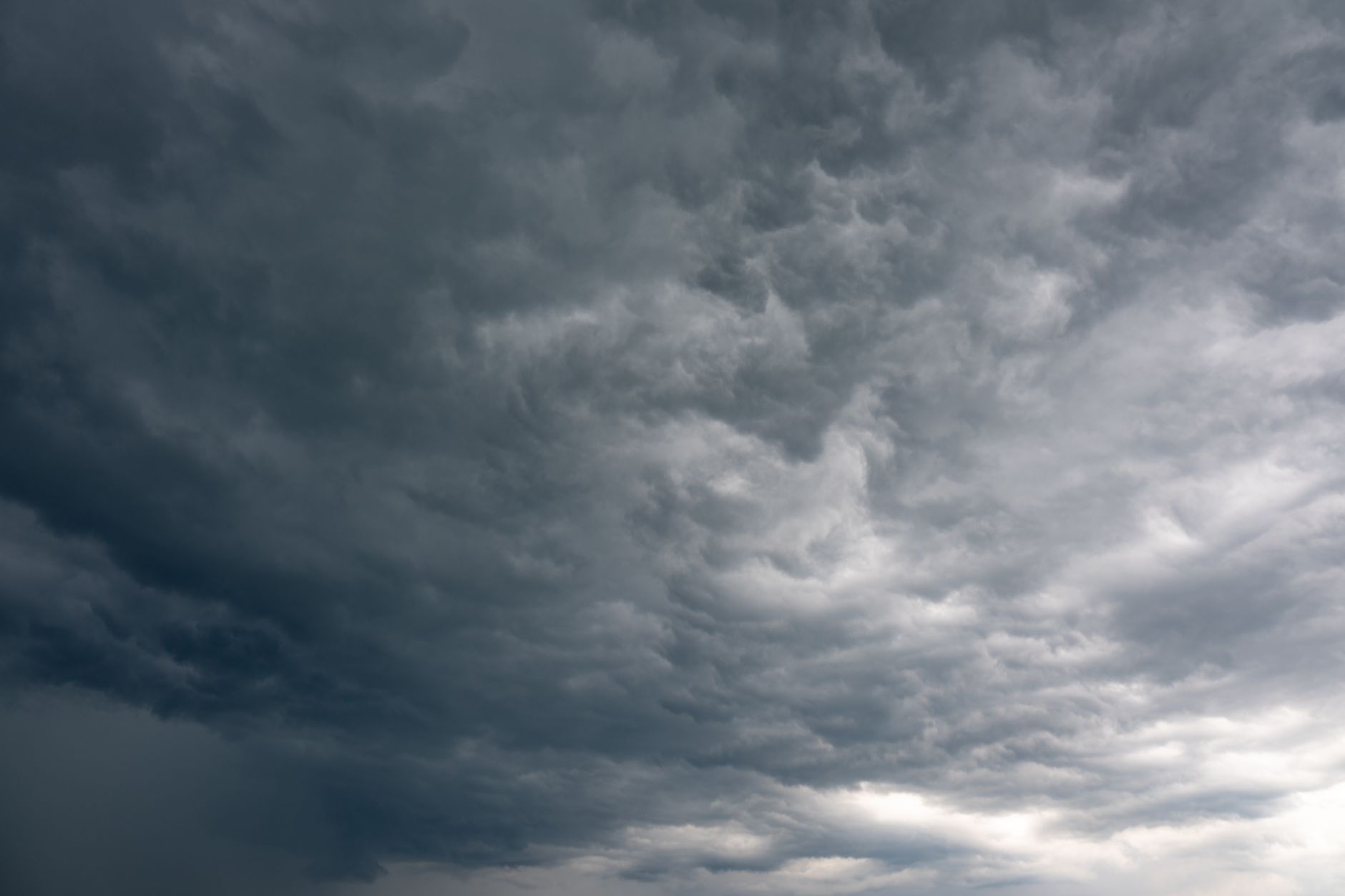 Storm clouds over a backyard